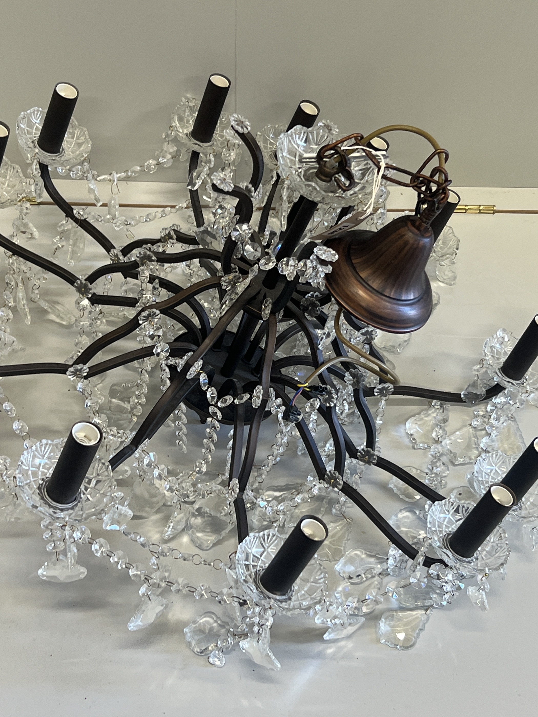 A twelve branch cut glass electrolier, diameter 84cm